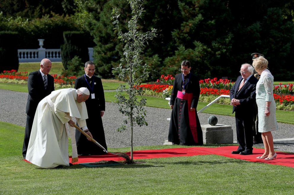 PHOTO: Pope Francis during a tree planting ceremony with President of Ireland Michael D. Higgins (2nd R) and his wife Sabina Coyne (R) at Aras an Uachtarain on Aug. 25, 2018 in Dublin, Ireland.