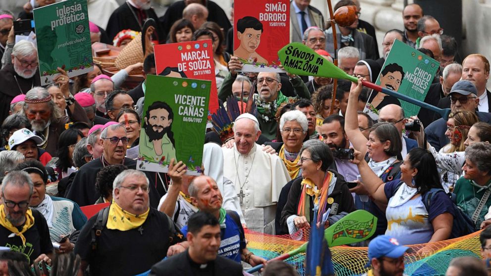 PHOTO: Representatives of the Amazon Rainforest's ethnic groups and Pope Francis march in procession during the opening of the Special Assembly of the Synod of Bishops for the Pan-Amazon Region, Oct. 7, 2019, outside St. Peter's Basilica in the Vatican.
