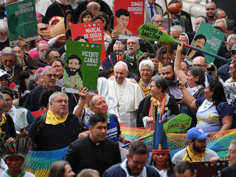 PHOTO: Representatives of the Amazon Rainforests ethnic groups and Pope Francis march in procession during the opening of the Special Assembly of the Synod of Bishops for the Pan-Amazon Region, Oct. 7, 2019, outside St. Peters Basilica in the Vatican.