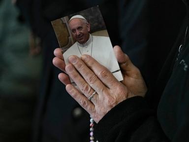 Pope has 'peaceful night' after his prognosis improves and is lifted