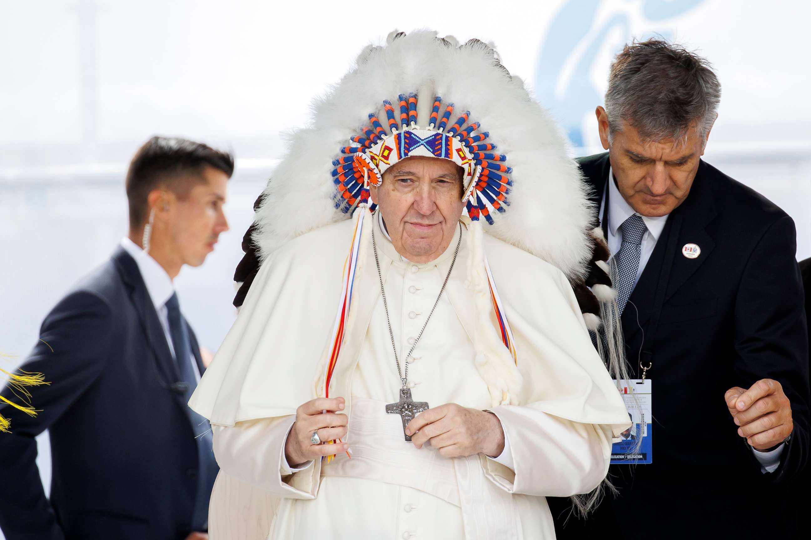 PHOTO: Pope Francis wears a traditional headdress that was gifted to him by Indigenous leaders following his apology during his visit on July 25, 2022 in Maskwacis, Canada.