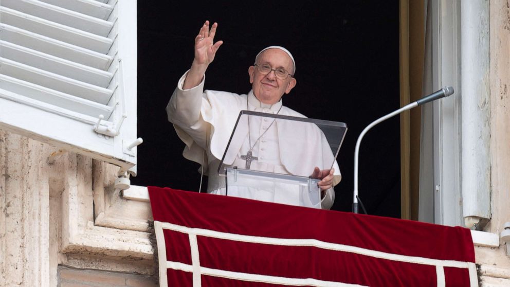PHOTO: Pope Francis waves from a window during the Regina Caeli prayer, in Saint Peter's Square at the Vatican May 8, 2022.