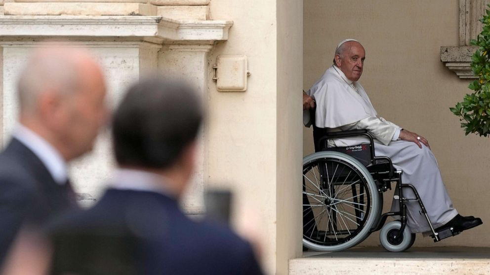 PHOTO: Pope Francis arrives on a wheelchair for an audience with children in the San Damaso courtyard at the Vatican, June 4, 2022.