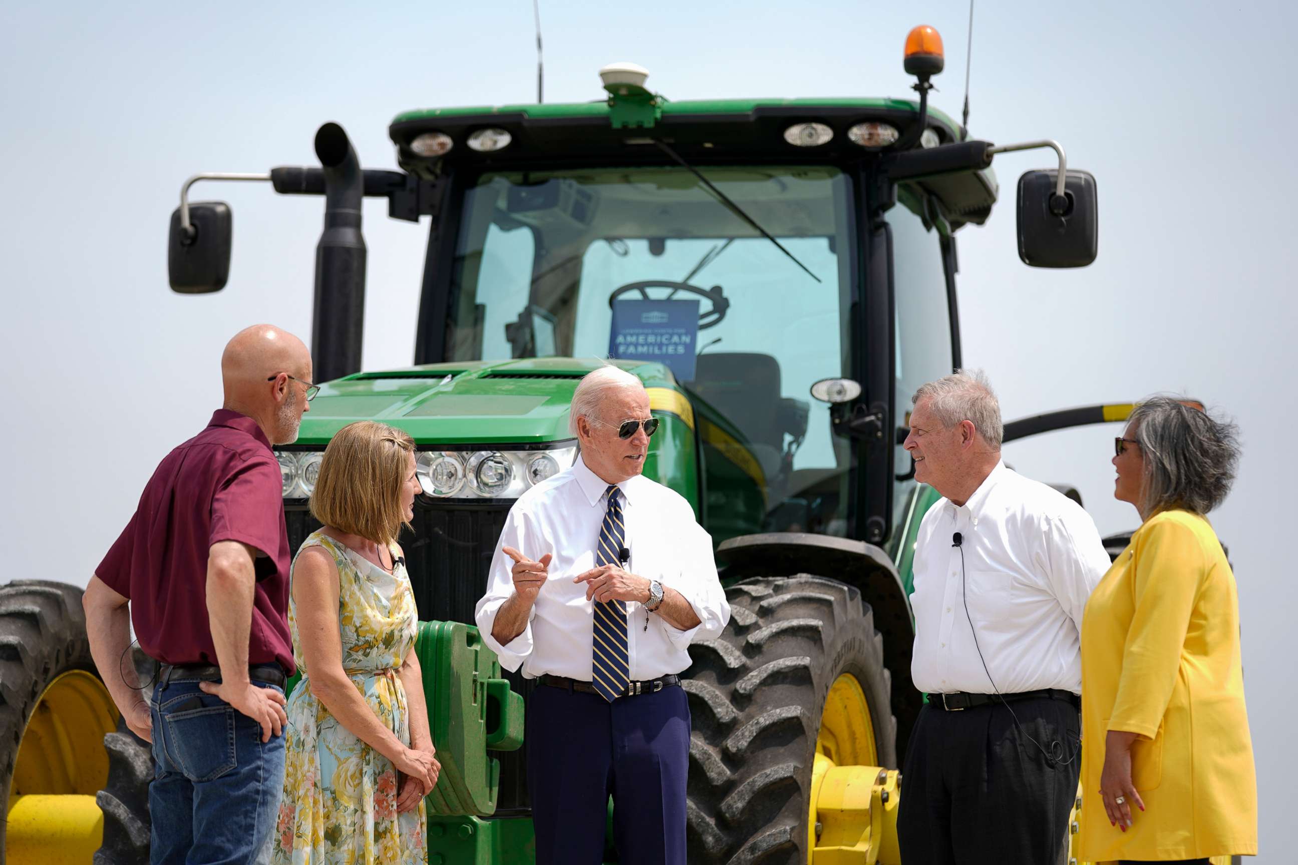 PHOTO: President Joe Biden speaks as he visits O'Connor Farms with owners Gina O'Connor, second from left, and Jeff O'Connor, left, Agriculture Secretary Tom Vilsack, second from right, and Rep. Robin Kelly, D-Ill., in Kankakee, Ill., May 11, 2022.