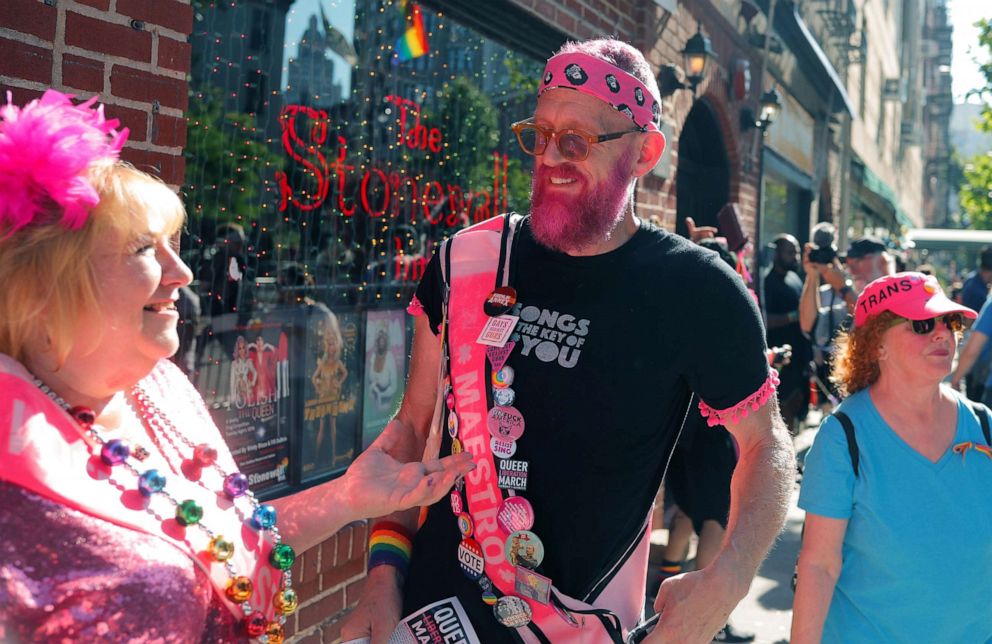 PHOTO: People gather outside the Stonewall Inn in Greenwich Village during the 2019 World Pride NYC and Stonewall 50th LGBTQ Pride day in New York, June 30, 2019.