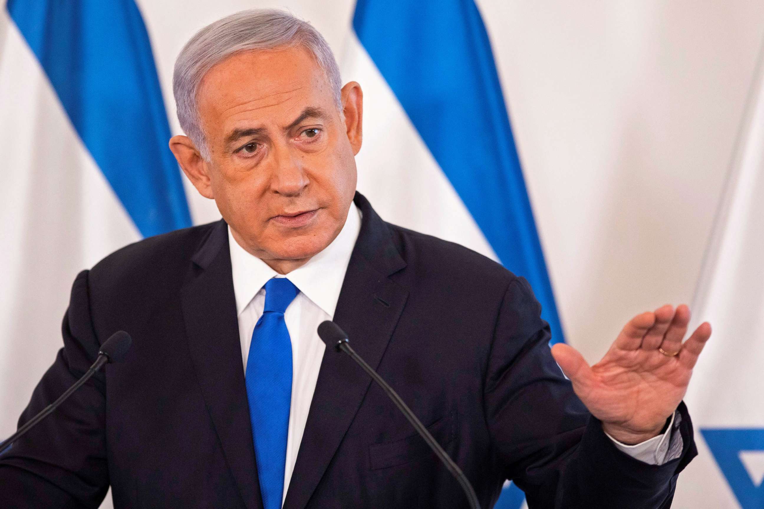 PHOTO: Israeli Prime Minister Benjamin Netanyahu gestures as he speaks during a briefing to ambassadors to Israel at a military base in Tel Aviv, Israel May 19, 2021. 