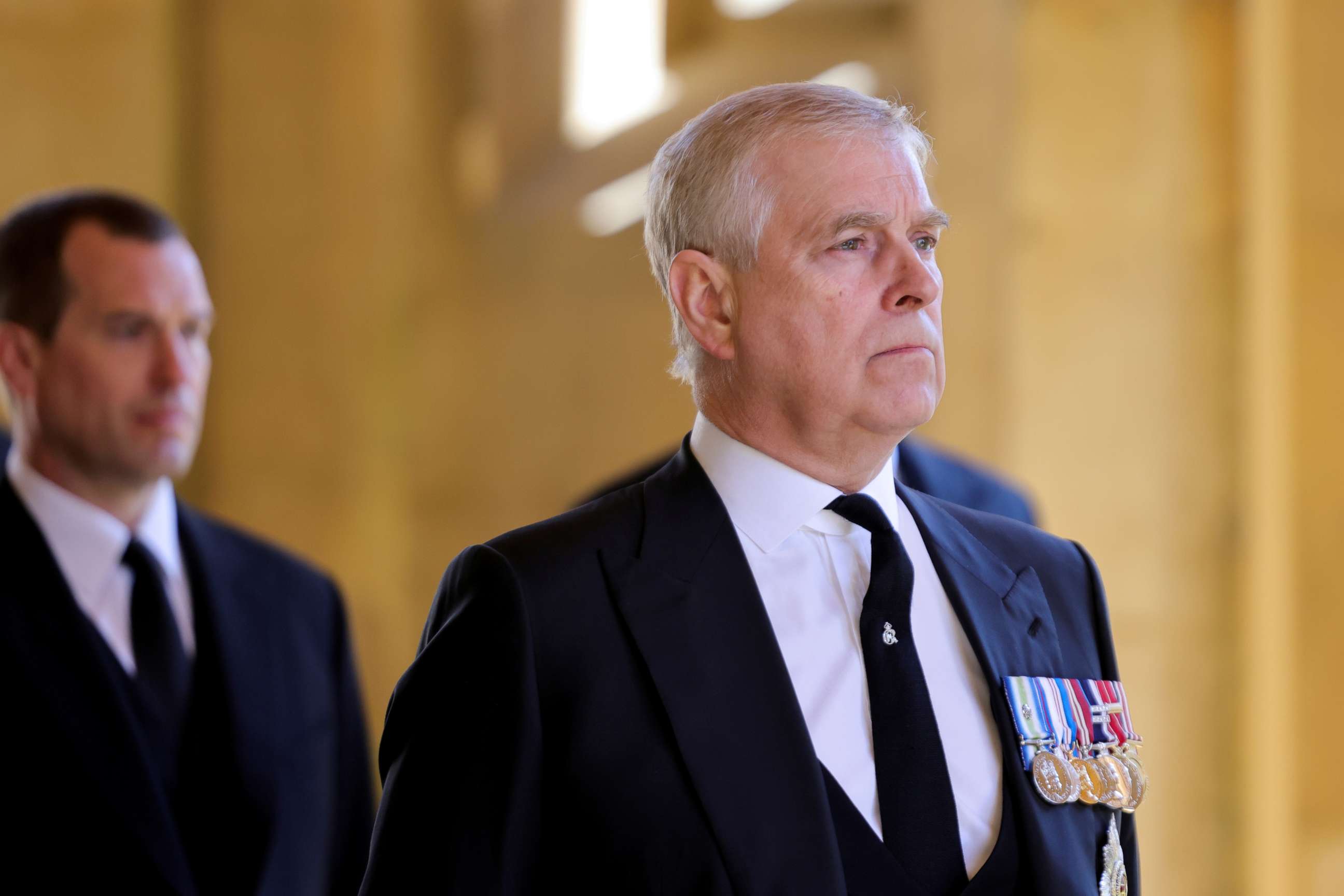 PHOTO: Britain's Britain's Prince Andrew, Duke of York, looks on during the funeral of Britain's Prince Philip, husband of Queen Elizabeth, on the grounds of Windsor Castle in Windsor, Britain, April 17, 2021.