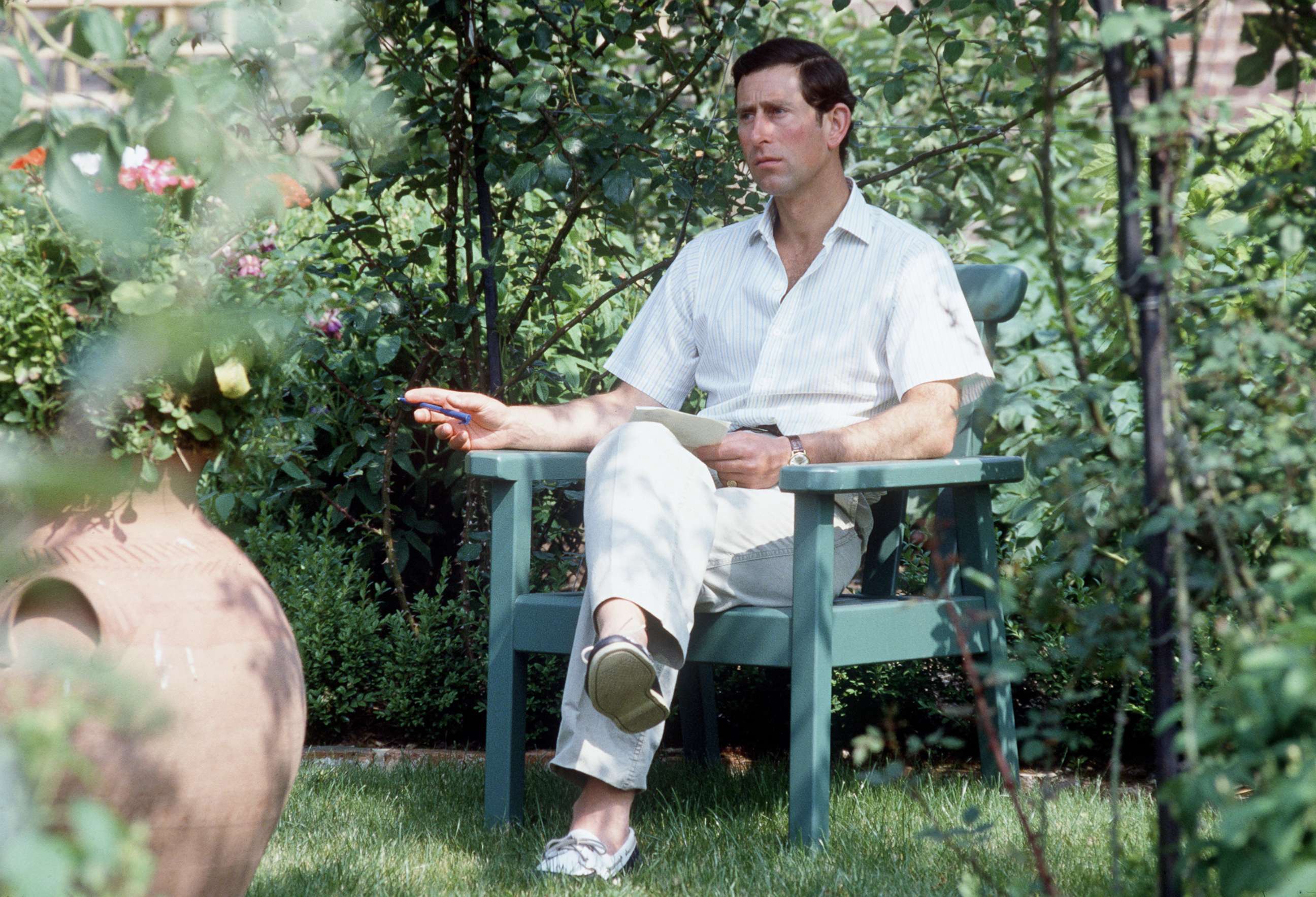 PHOTO: Prince Charles Sitting In His Garden At Highgrove, Gloucestershire, England, on July 14, 1986.