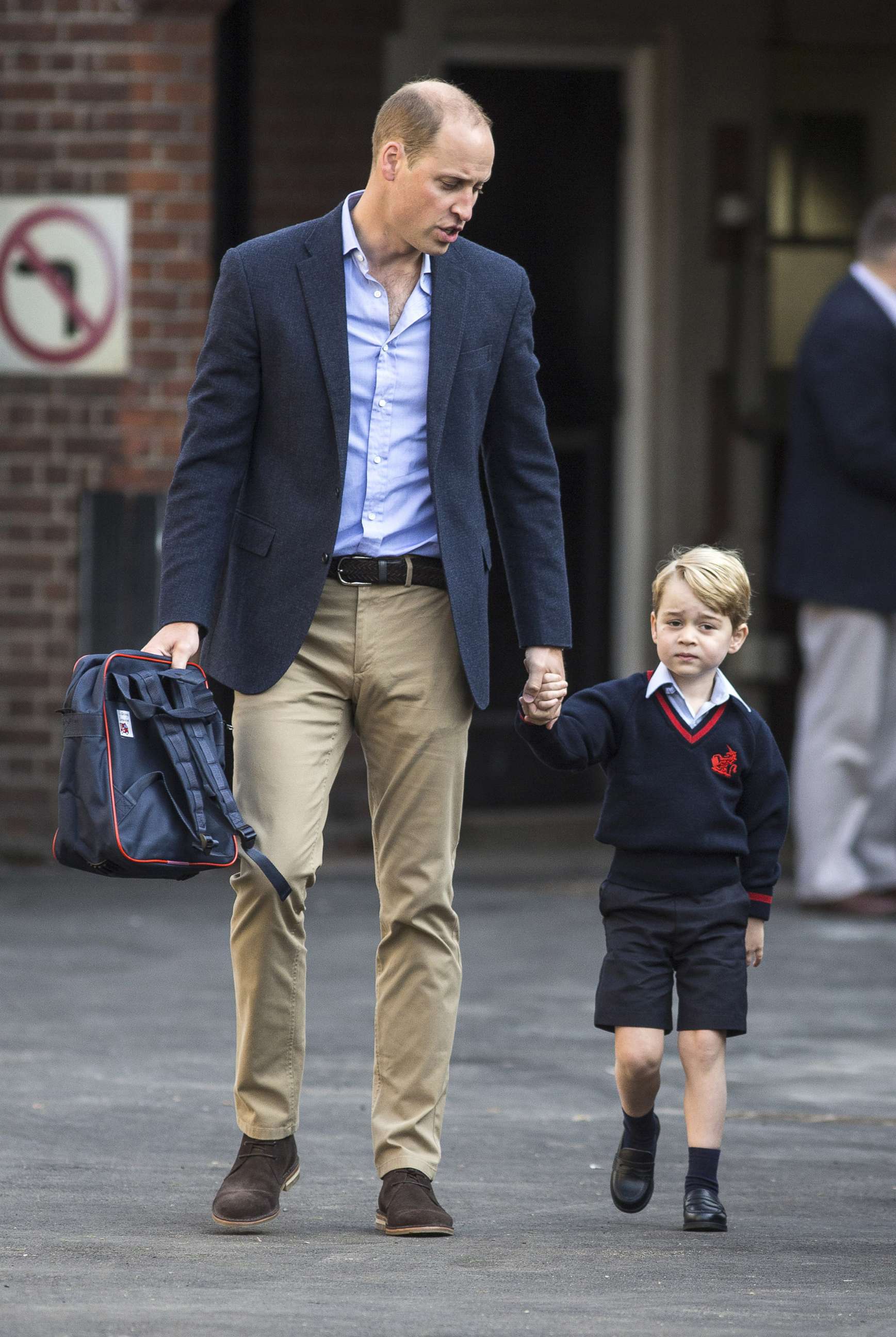 PHOTO: Prince George of Cambridge arrives for his first day of school with his father Prince William, Duke of Cambridge at Thomas's Battersea, Sept. 7, 2017 in London. 