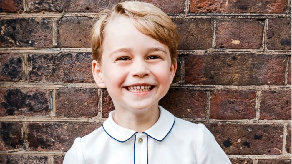 PHOTO: In this photo taken July 9, 2018, Prince George poses following the christening of his brother Prince Louis, at Clarence House in London. Britain's Prince William and Kate, Duchess of Cambridge released the photo of to mark his birthday.