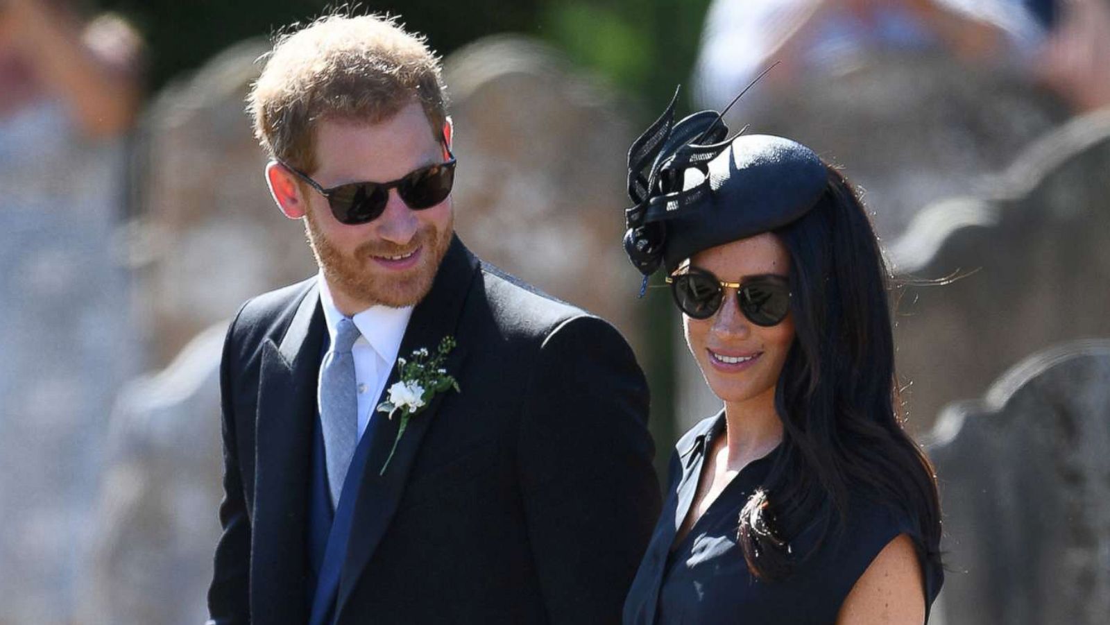 PHOTO: The Duke and Duchess of Sussex walk outside St. Mary the Virgin Church in Frensham, Surrey, on Aug. 4, 2018, after attending the wedding of Charlie van Straubenzee and Daisy Jenks.