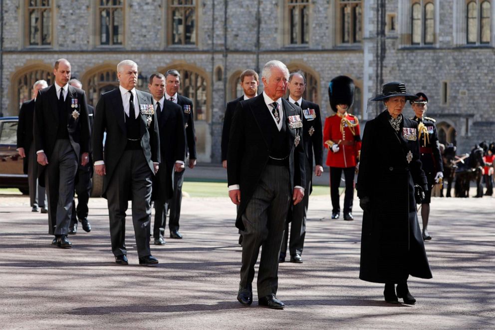 PHOTO: Prince Charles, Prince of Wales, and other members of the royal family follow Prince Philip, Duke of Edinburgh's coffin during the Ceremonial Procession at Windsor Castle on April 17, 2021, in Windsor, England.