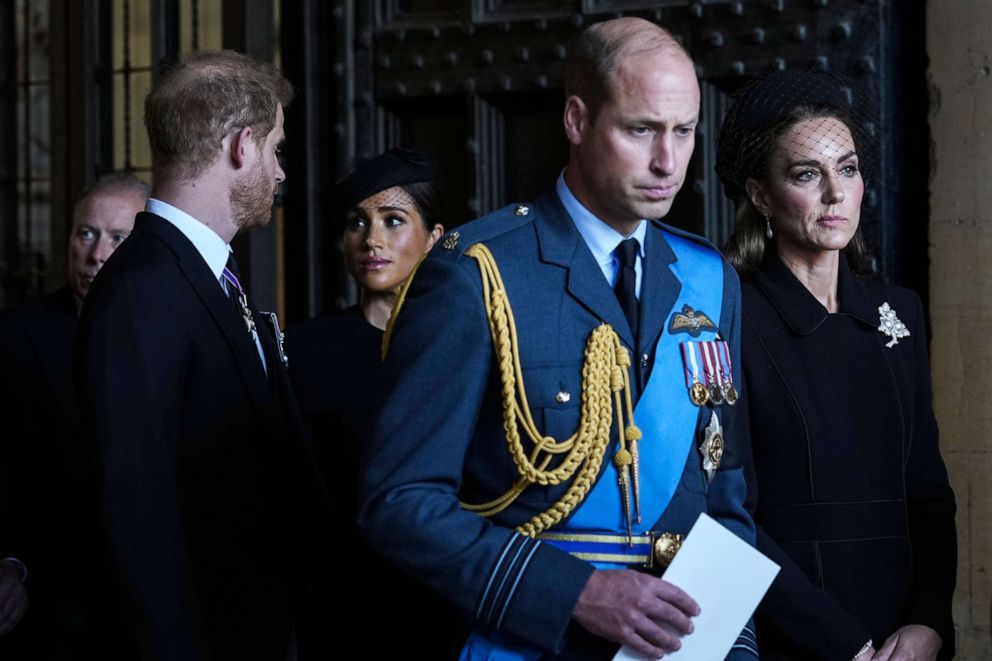 PHOTO: Prince William, second right, Kate, Princess of Wales, right, Prince Harry, left, and Meghan, Duchess of Sussex, second left, leave after they paid their respects to Queen Elizabeth II lying in state at Westminster Hall, in London, Sept. 14, 2022.