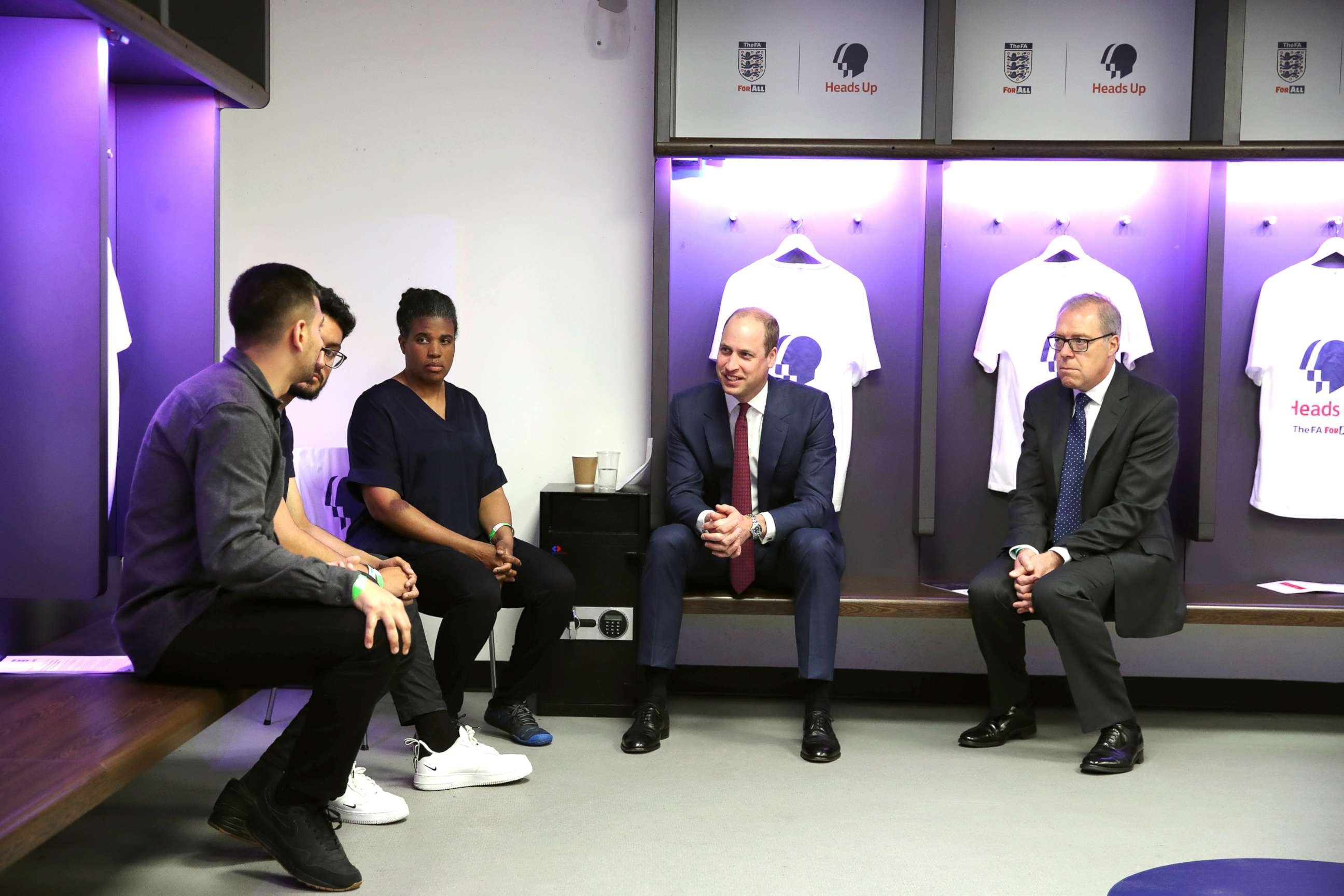 PHOTO: Britain's Prince William, Duke of Cambridge (second right) speaks with stakeholders from the grassroots of football as he attends the launch of a new mental health campaign at Wembley Stadium in London on May 15, 2019.