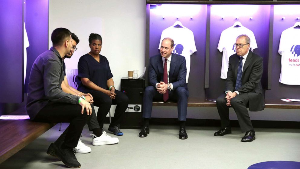 PHOTO: Britain's Prince William, Duke of Cambridge (second right) speaks with stakeholders from the grassroots of football as he attends the launch of a new mental health campaign at Wembley Stadium in London on May 15, 2019.