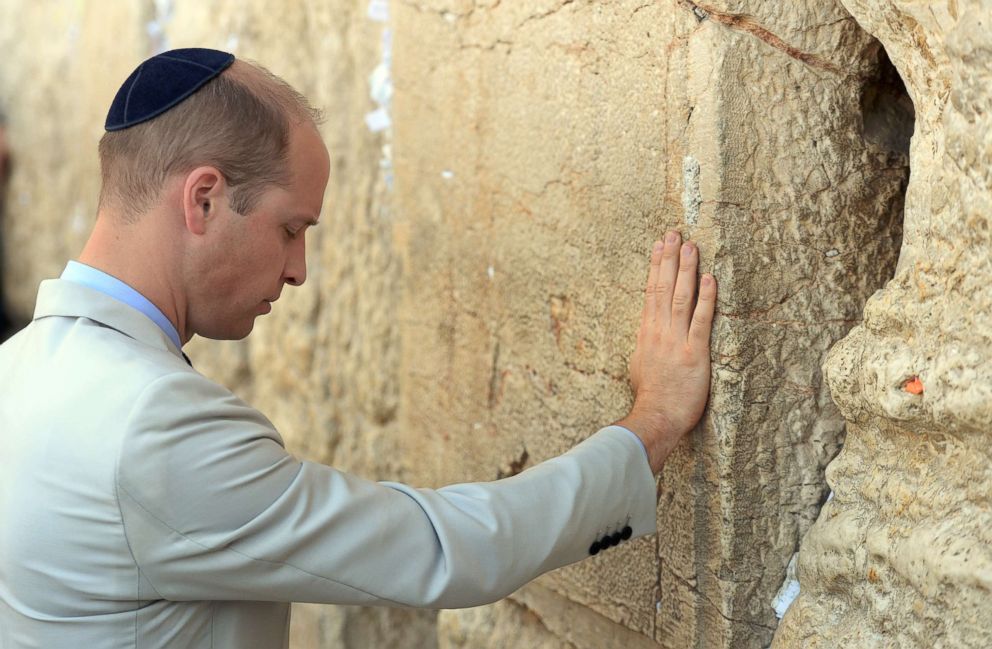 PHOTO: Prince William, Duke of Cambridge touches the Western Wall, Judaism's holiest place of prayer, during his visit in Jerusalem's Old City, June 28, 2018, in Jerusalem.