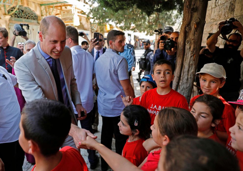 PHOTO: Britain's Prince William talks to Palestinian children during a visit to Jerusalem's Old City, June 28, 2018.