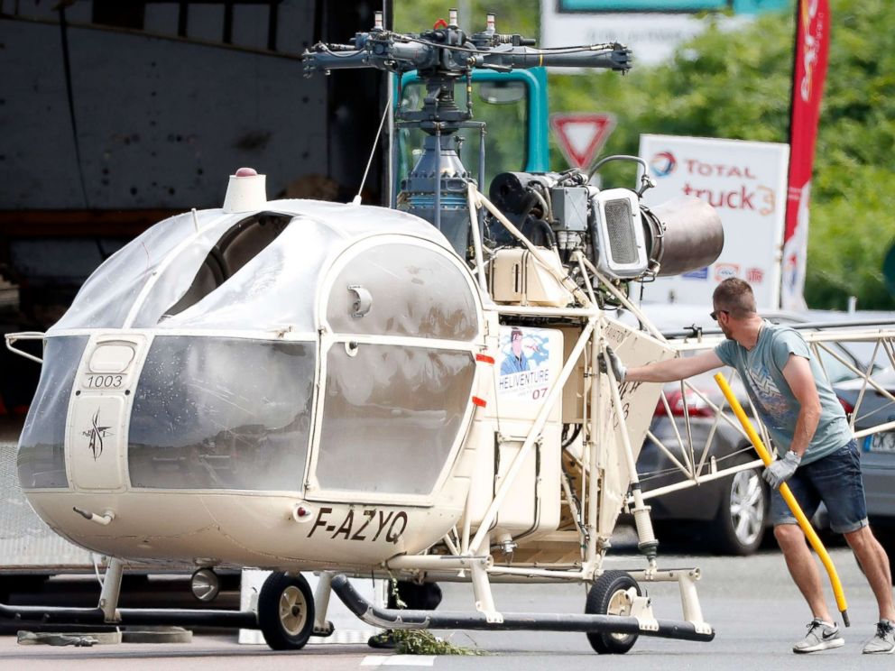 PHOTO: Investigators transport an Alouette II helicopter allegedly abandoned by French prisoner Redoine Faid and suspected accomplices after his escape from the prison of Reau, in Gonesse, north of Paris, July 1, 2018.
