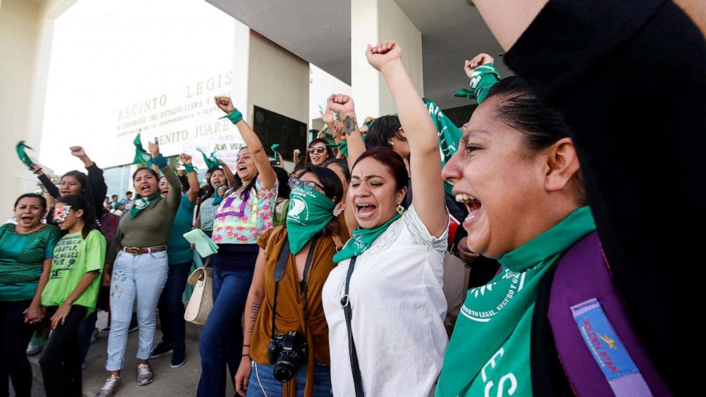 PHOTO: Pro-choice demonstrators celebrate after lawmakers passed a legislation that decriminalizes abortion, outside the local congress in Oaxaca, Mexico Sept. 25, 2019.