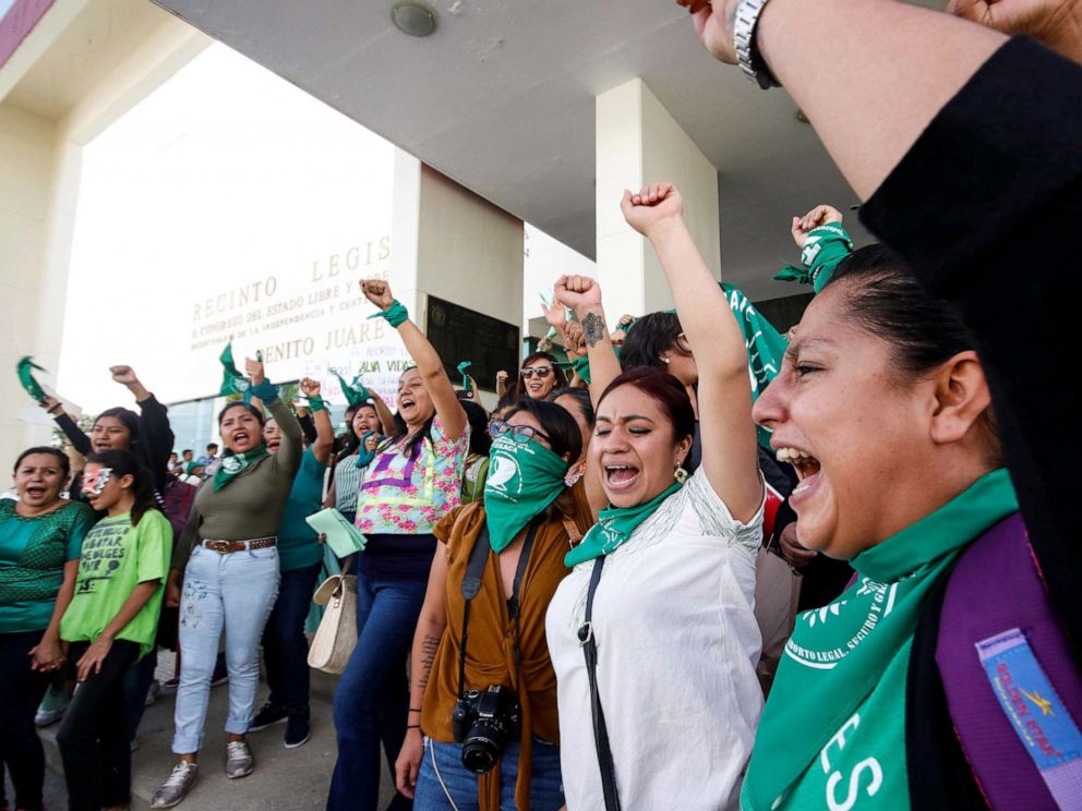 PHOTO: Pro-choice demonstrators celebrate after lawmakers passed a legislation that decriminalizes abortion, outside the local congress in Oaxaca, Mexico Sept. 25, 2019.