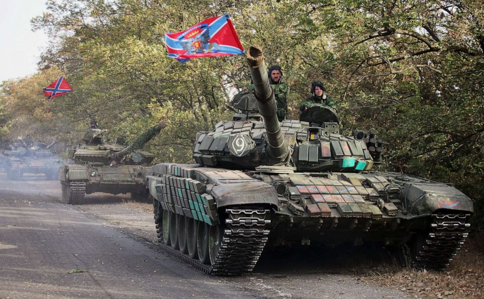 PHOTO: Pro-Russian separatist soldiers withdraw their tanks from position  near town of Novoazovsk in Donetsk region, Oct. 21, 2015. 