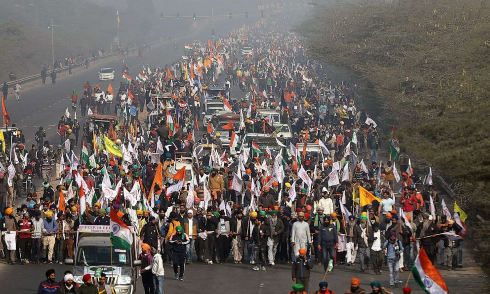 PHOTO: Farmers in large numbers take part in a 'parallel parade' on tractors and trolleys, during their ongoing farmers protest against the new agricultural laws, on the outskirts of New Delhi, Jan. 26, 2021.