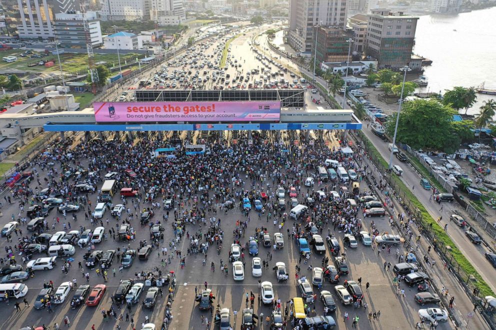 PHOTO: An aerial view shows protesters gathering at the Lekki toll gate in Lagos, Nigeria, on Oct. 15, 2020, during a demonstration against police brutality and the now-disbanded Special Anti-Robbery Squad (SARS).