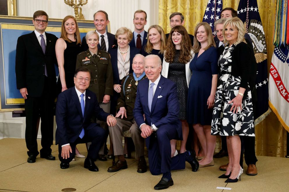 President Joe Biden, South Korea's President Moon Jae-in and first lady Jill Biden with Korean War-era Army Colonel Ralph Puckett, center, during a Medal of Honor ceremony for Puckett in the East Room at the White House in Washington, May 21, 2021.