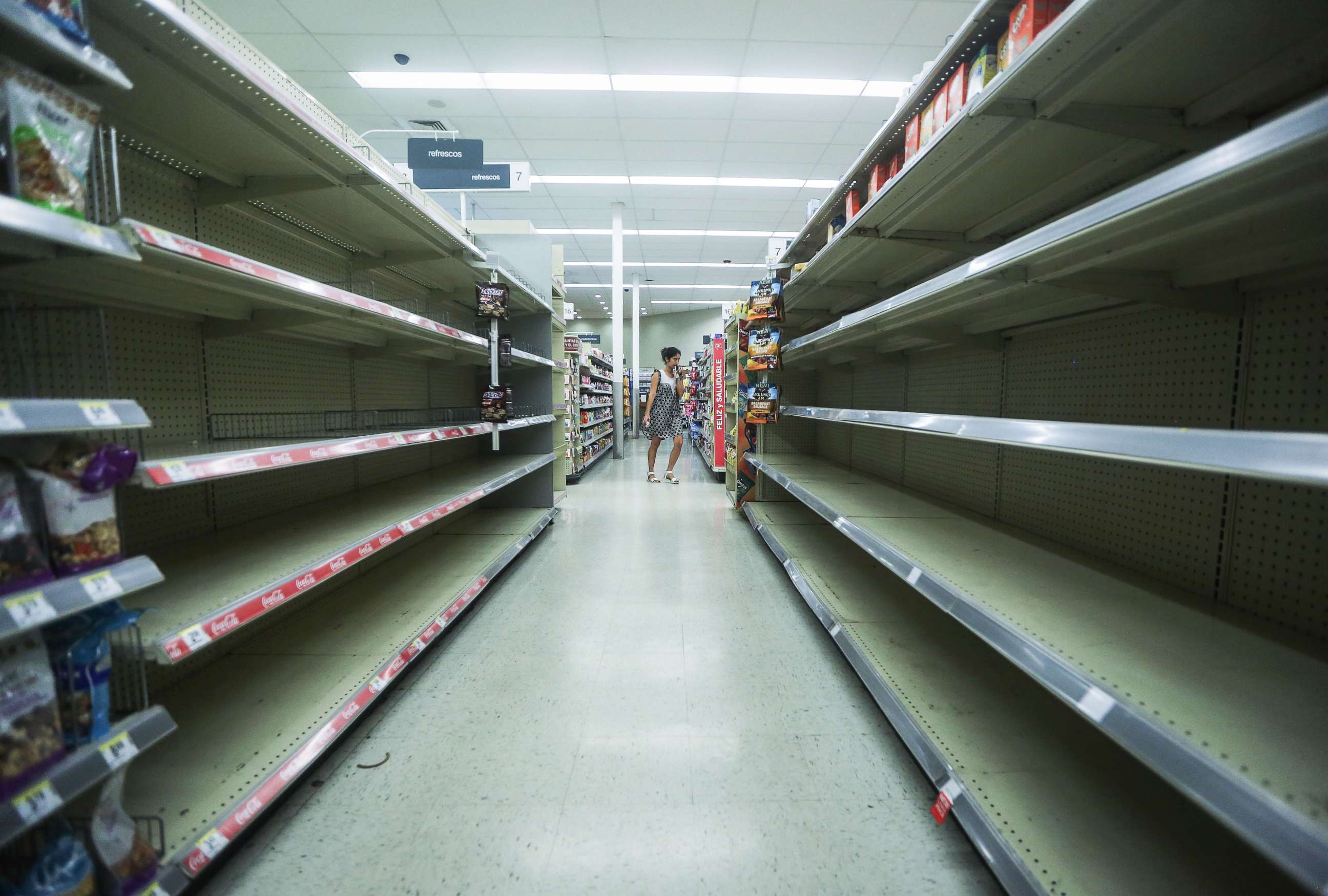PHOTO: Beverage shelves stand mostly empty in a Walgreen's store over three weeks after Hurricane Maria hit the island, Oct. 13, 2017 in San Juan, Puerto Rico. 