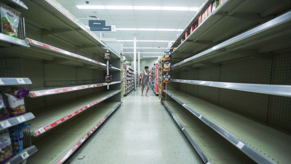 PHOTO: Beverage shelves stand mostly empty in a Walgreen's store over three weeks after Hurricane Maria hit the island, Oct. 13, 2017 in San Juan, Puerto Rico.