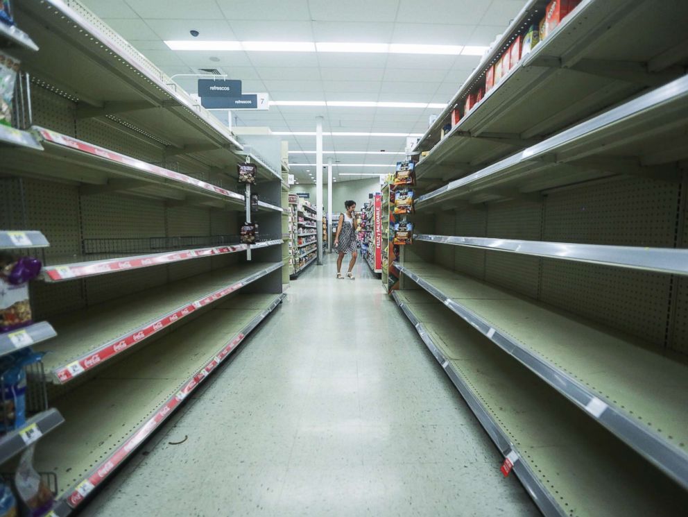 PHOTO: Beverage shelves stand mostly empty in a Walgreens store over three weeks after Hurricane Maria hit the island, Oct. 13, 2017 in San Juan, Puerto Rico.