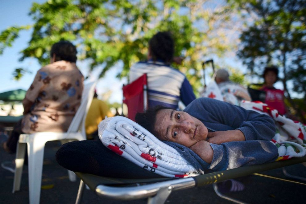 PHOTO: Maribel Rivera Silva, 58-years-old, rests outside a shelter due to concerns over aftershocks following an earthquake in Guanica, Puerto Rico, Jan. 7, 2020.