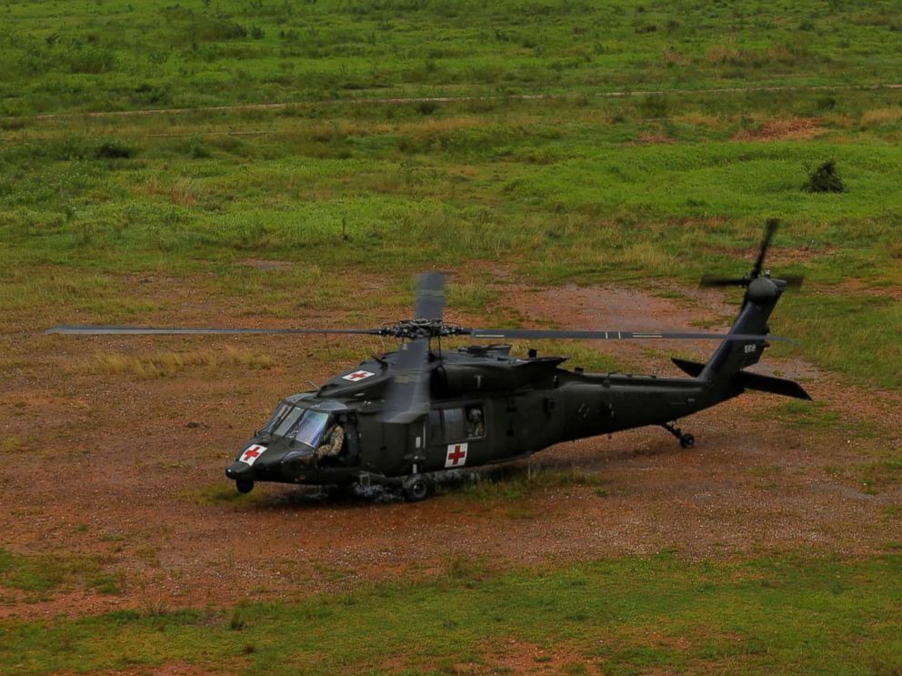 PHOTO: An HH-60 Blackhawk helicopter from 101st Airborne Divisions Dustoff unit lands in a field to avoid lightning during recovery efforts following Hurricane Maria, in Manati, Puerto Rico, Oct. 5, 2017.