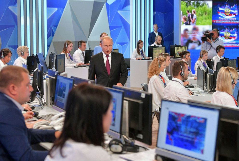 PHOTO: Russian President Vladimir Putin arrives to attend his annual live broadcast nationwide television and radio session "Direct Line with Vladimir Putin" at the Gostiny Dvor studio in Moscow, June 20, 2019.