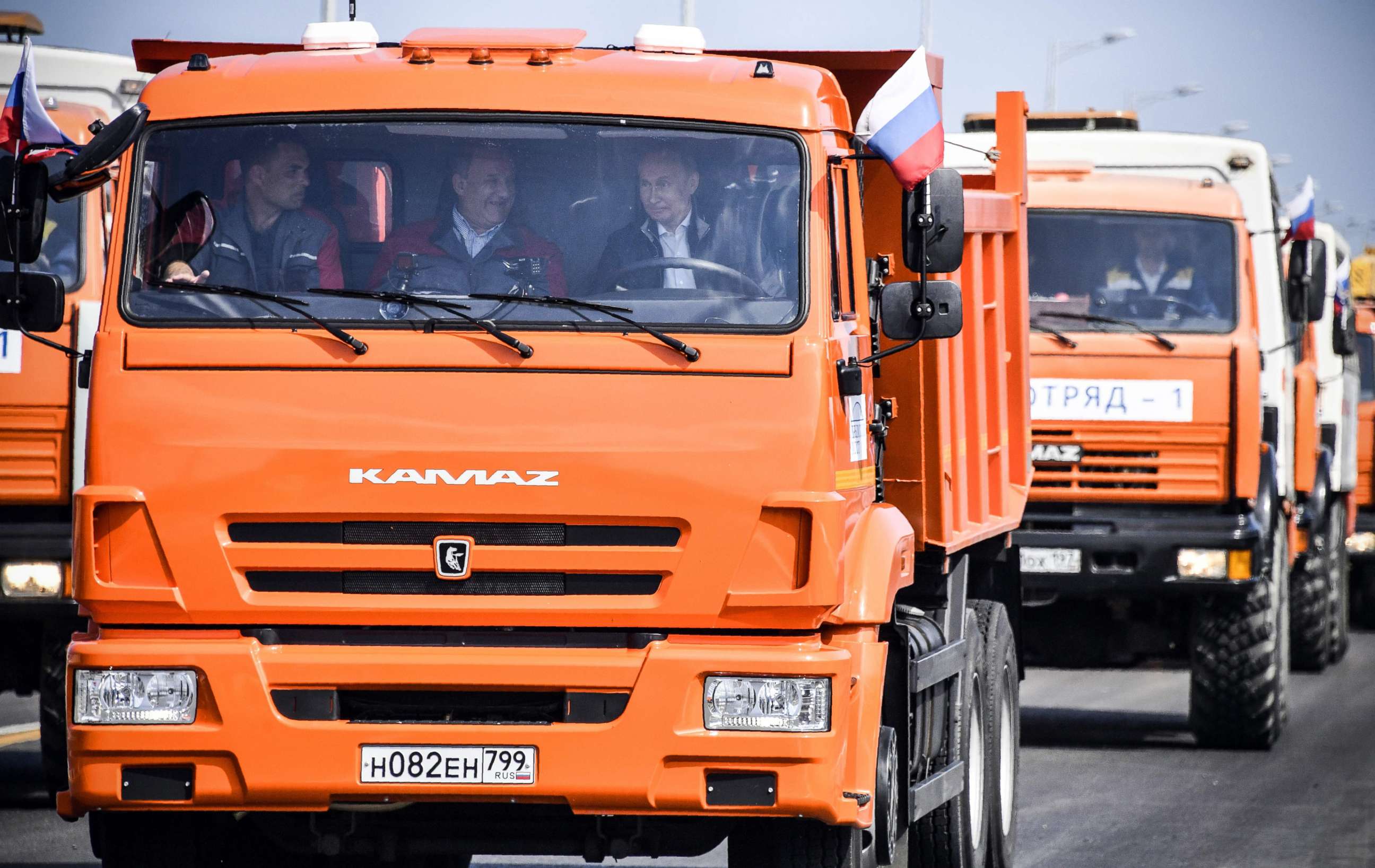 PHOTO: Russian President Vladimir Putin drives a construction truck across the new 12 mile road-and-rail Crimean Bridge over the Kerch Strait linking mainland Russia to Moscow-annexed Crimea during the opening ceremony, May 15, 2018.