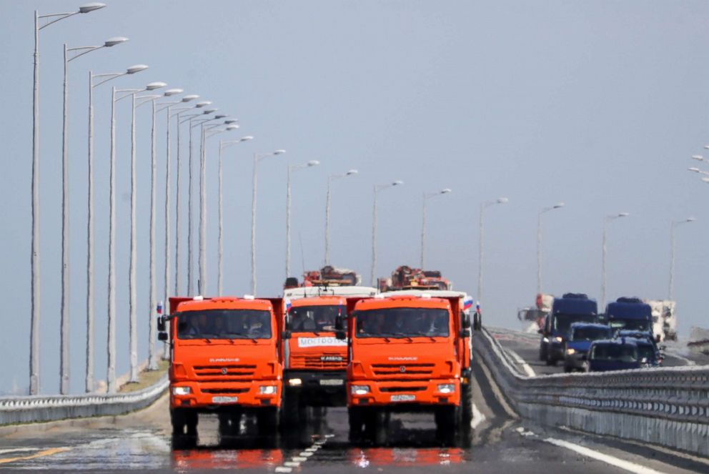 PHOTO: A convoy of construction machines passing through the Kerch Strait (Crimean) Bridge, May 15, 2018, in Kerch, Russia.