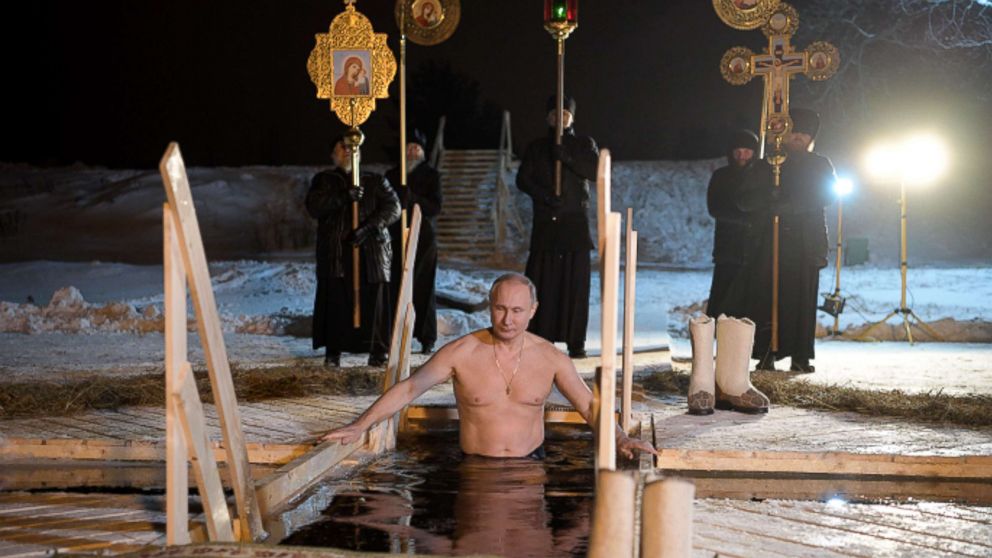 PHOTO: Russia's President Vladimir Putin dips in the icy waters of Lake Seliger during the celebration of Epiphany.