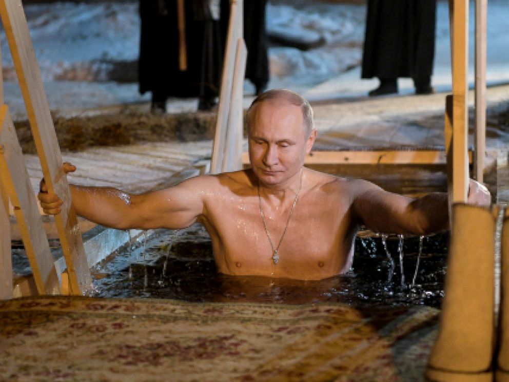 Shirtless Vladimir Putin takes dip in icy Russian lake for the Epiphany -  ABC News