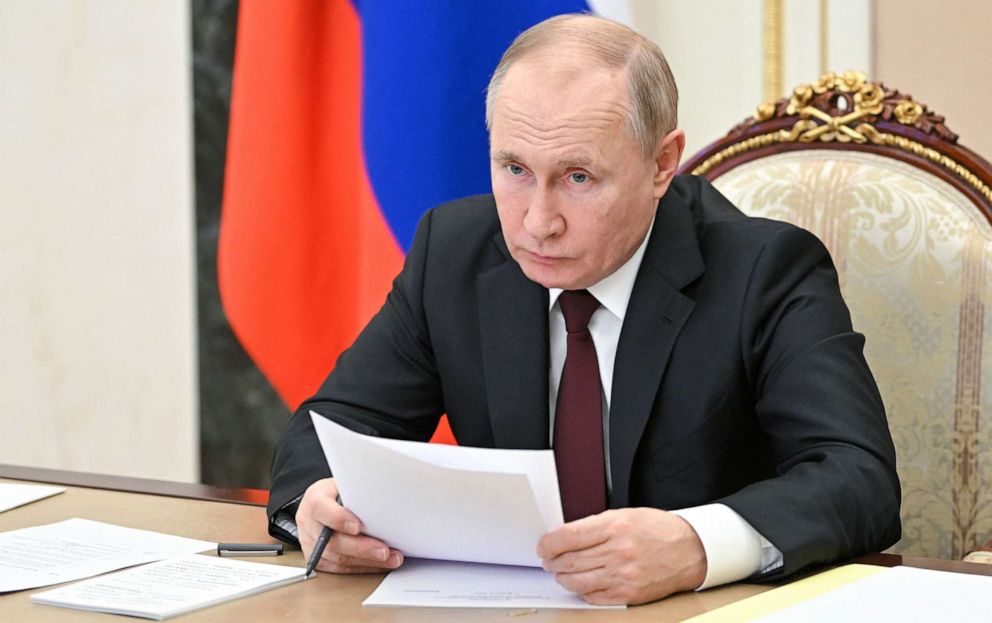 PHOTO: Russia's President Vladimir Putin chairs a meeting on economic issues in Moscow, on Feb. 17, 2022.