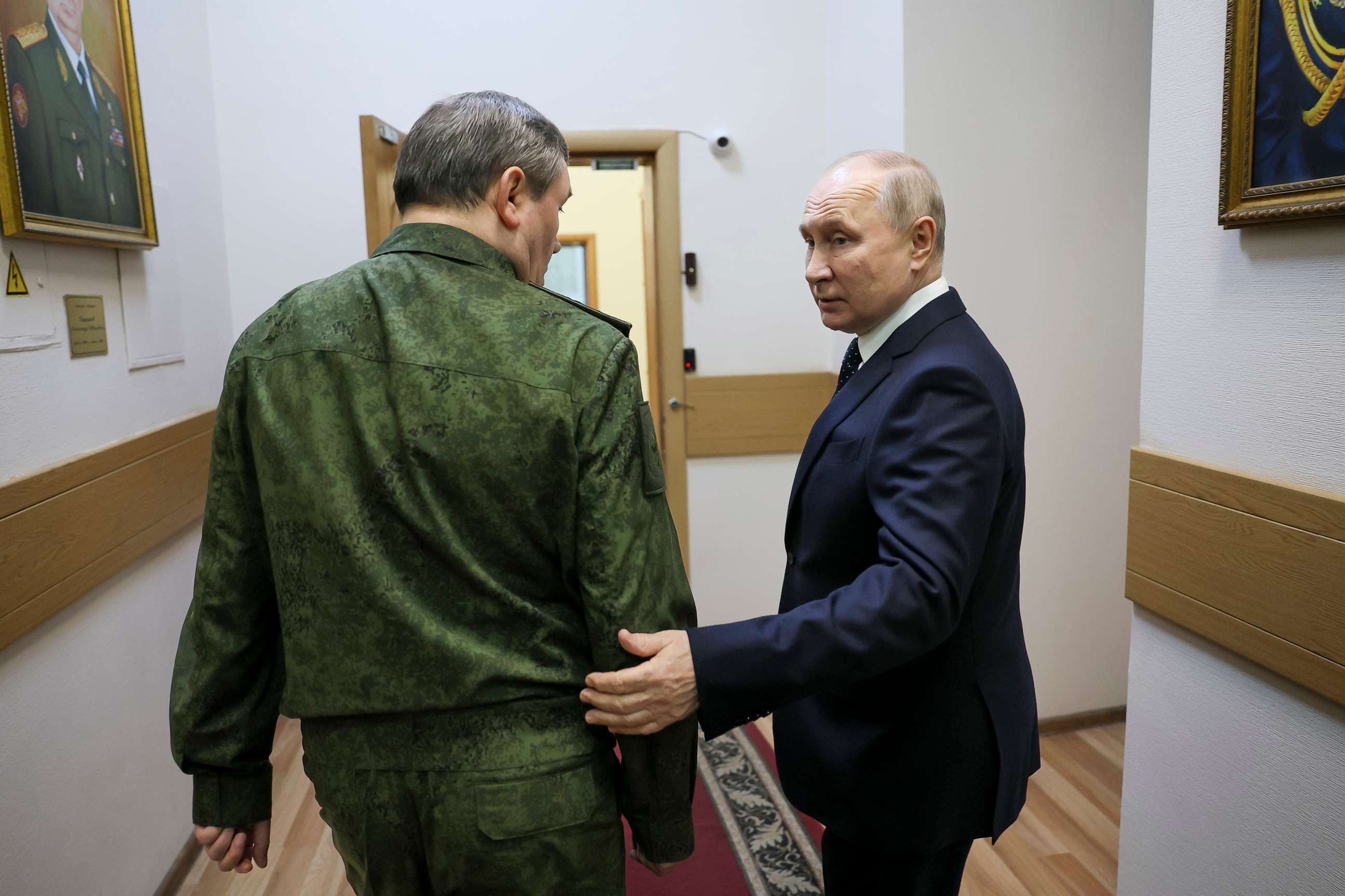 PHOTO: Russian President Vladimir Putin, right, and Russian Chief of General Staff Valery Gerasimov talk to each other at the headquarters of Russia's Southern Military District in Rostov-on-Don, Russia, Thursday, Oct. 19, 2023.