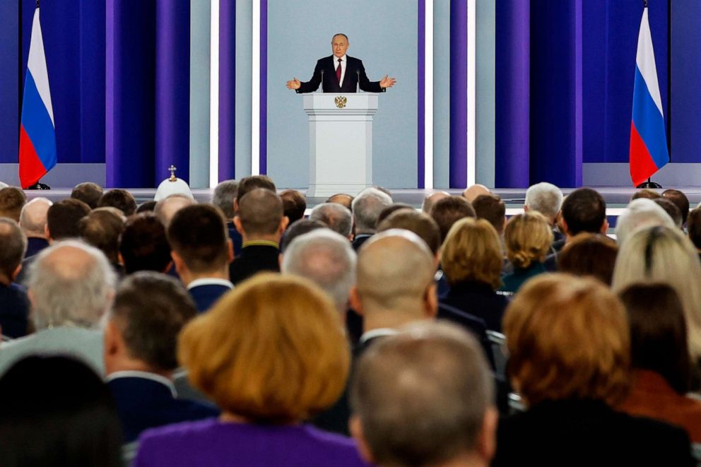 PHOTO: Russian President Vladimir Putin gestures as he gives his annual state of the nation address in Moscow, Russia, Feb. 21, 2023.