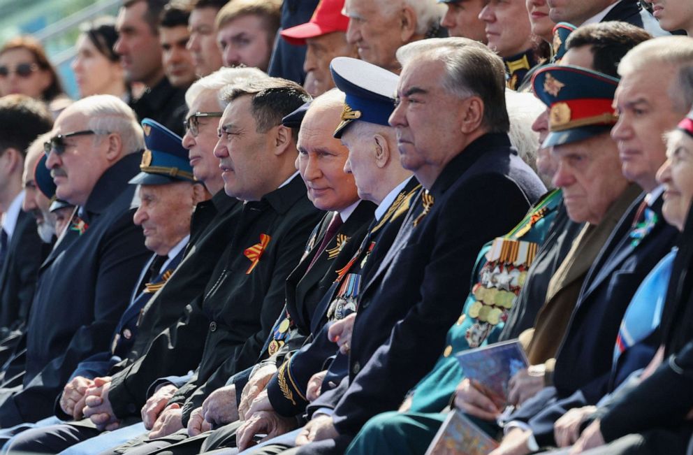 PHOTO: Russian President Vladimir Putin and guests attend the Victory Day military parade at Red Square in central Moscow, Russia, May 9, 2023.