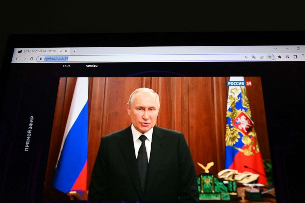 PHOTO: This photograph shows Russia's President Vladimir Putin, seen on a laptop screen, making a statement in Moscow, on June 24, 2023 as Wagner fighters stage rebellion.