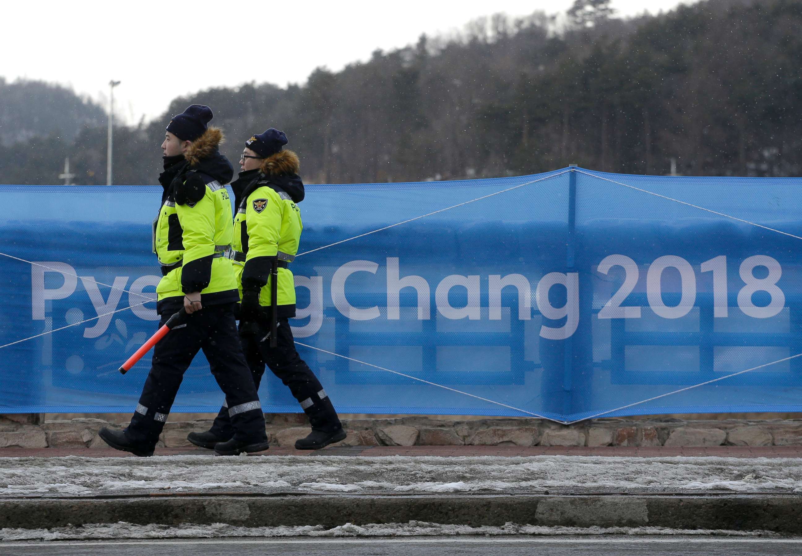 PHOTO: Security workers patrol the Alpensia resort at the 2018 Winter Olympics in Pyeongchang, South Korea, Feb. 2, 2018.