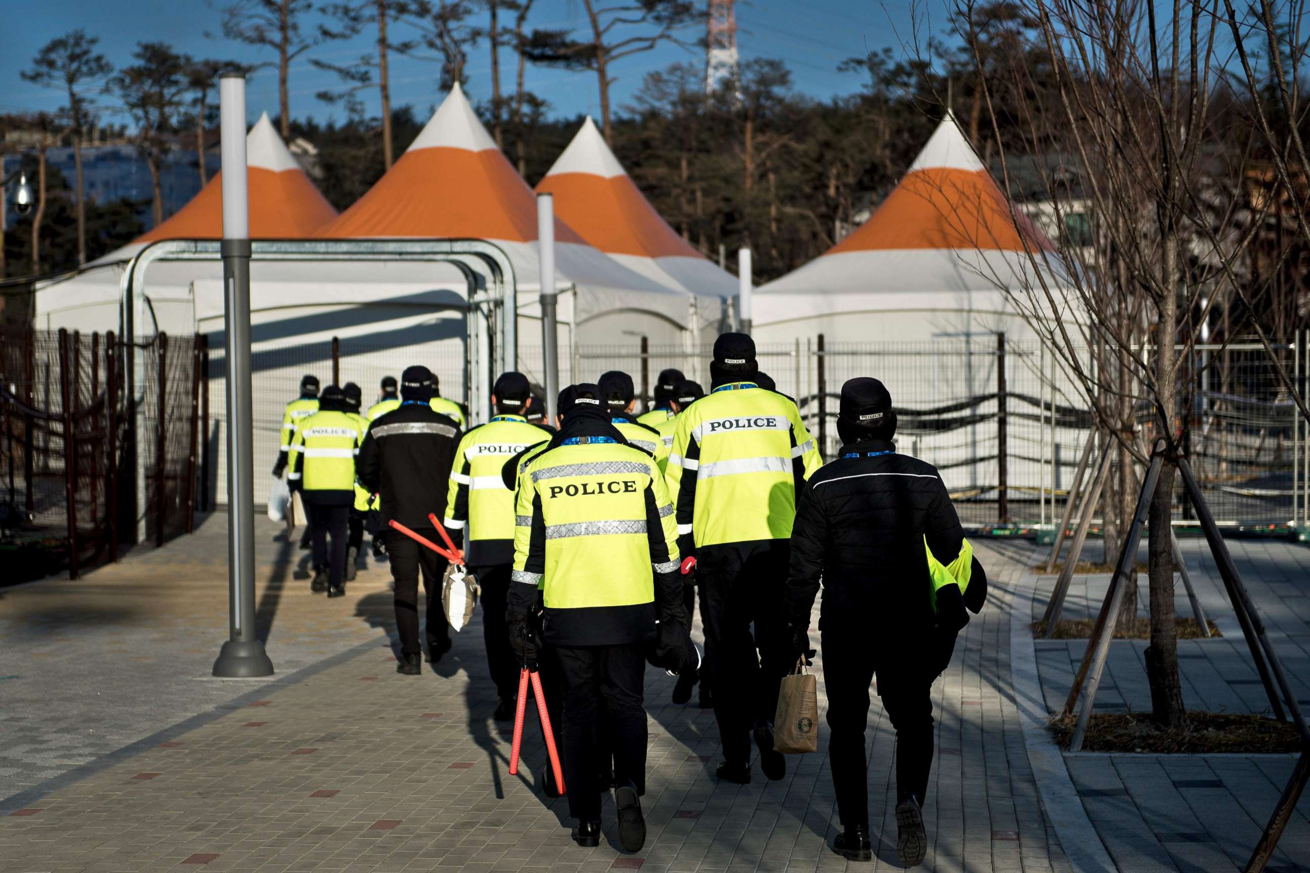PHOTO: Policemen are seen outside the Kwandong Hockey Centre before the Pyeongchang 2018 Winter Olympic Games, Feb. 6, 2018 in Gangneung, South Korea.