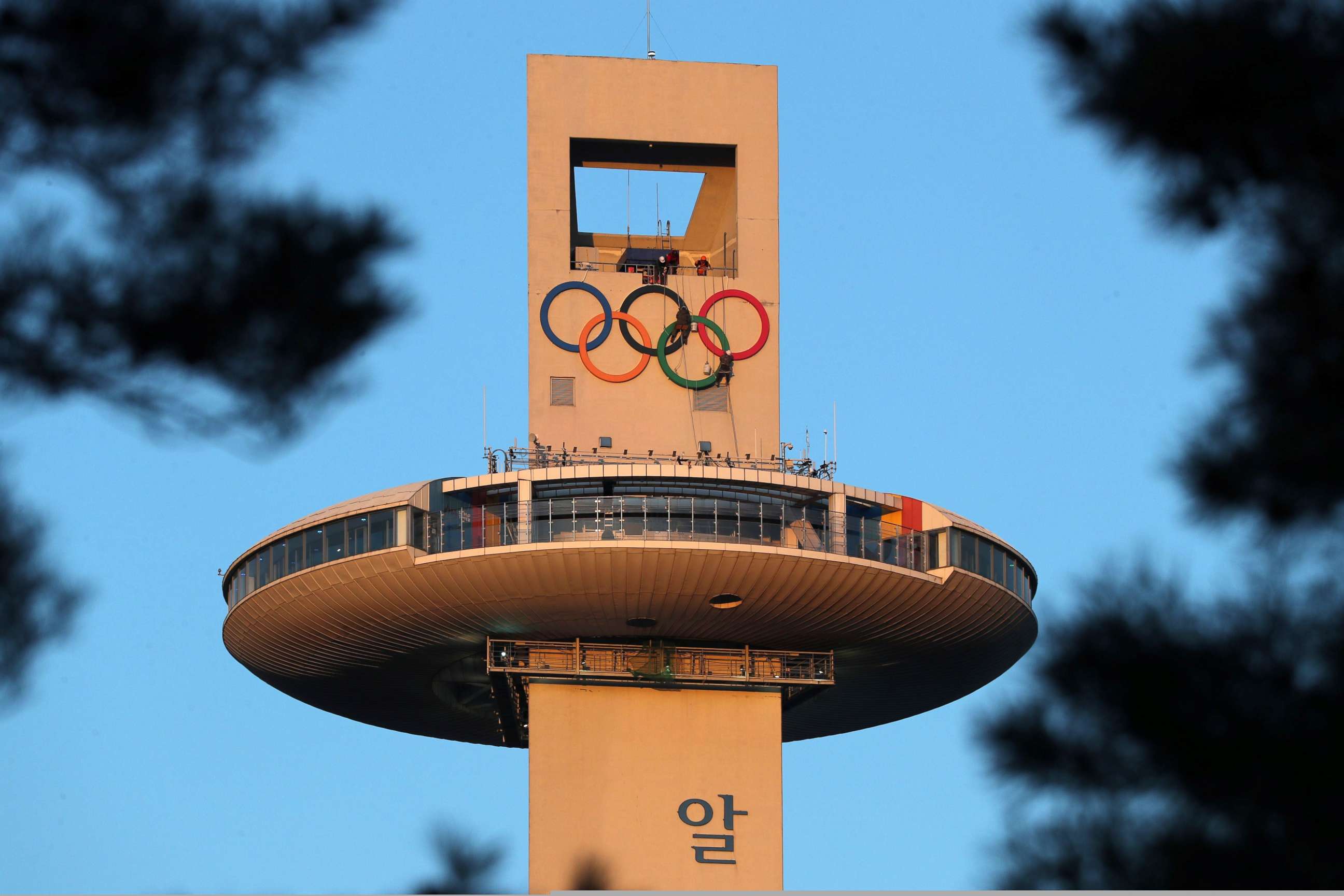 PHOTO: Olympic rings are displayed on the ski jump tower at Pyeongchang Alpensia Olympic park in preparation for the 2018 Pyeongchang winter Olympic Games,  Jan. 27, 2018, in Pyeongchang.