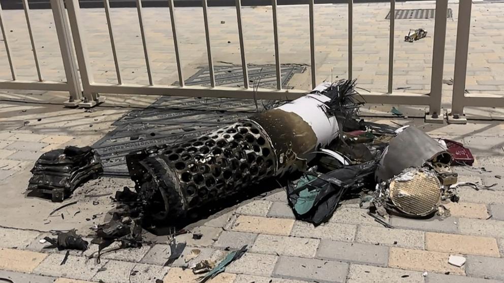 PHOTO: The remnants of an Iranian missile intercepted over Qatar lies on the pavement, June 23, 2025. 