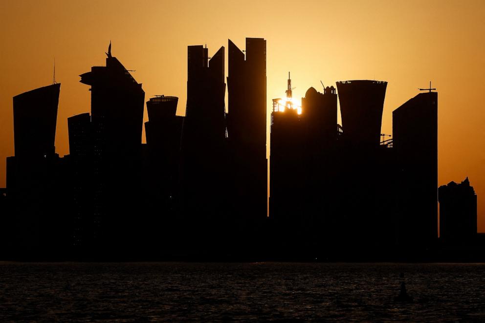 PHOTO: The sun sets behind the Doha skyline on June 29, 2026. ATAR-ECONOMY