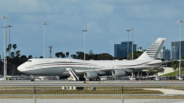 A Qatari Boeing 747 sits on the tarmac of Palm Beach International airport after President Donald Trump toured the aircraft, February 15, 2025.