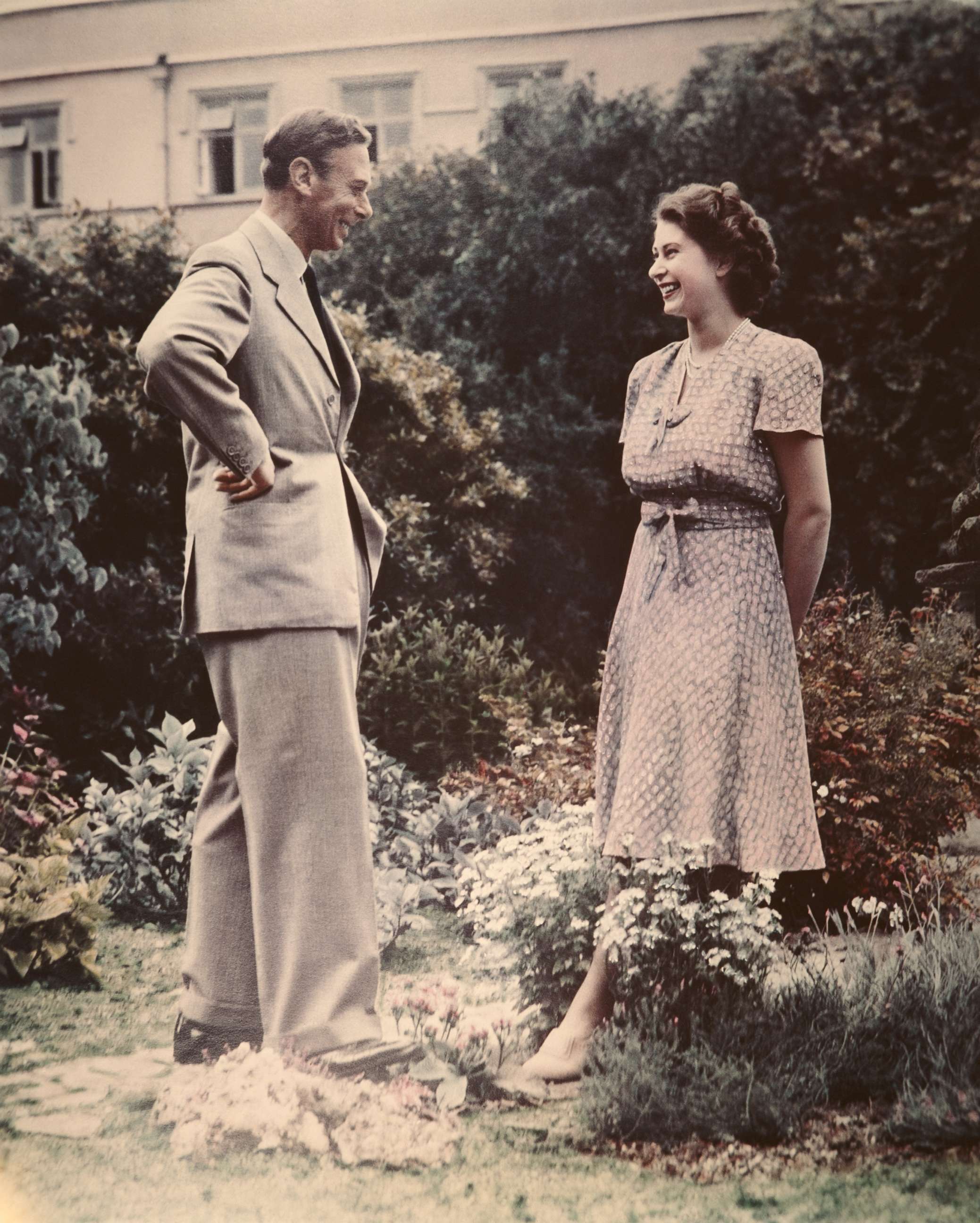PHOTO: Princess Elizabeth, the future Queen Elizabeth II, talking with her father, King George VI, July 8, 1946. 